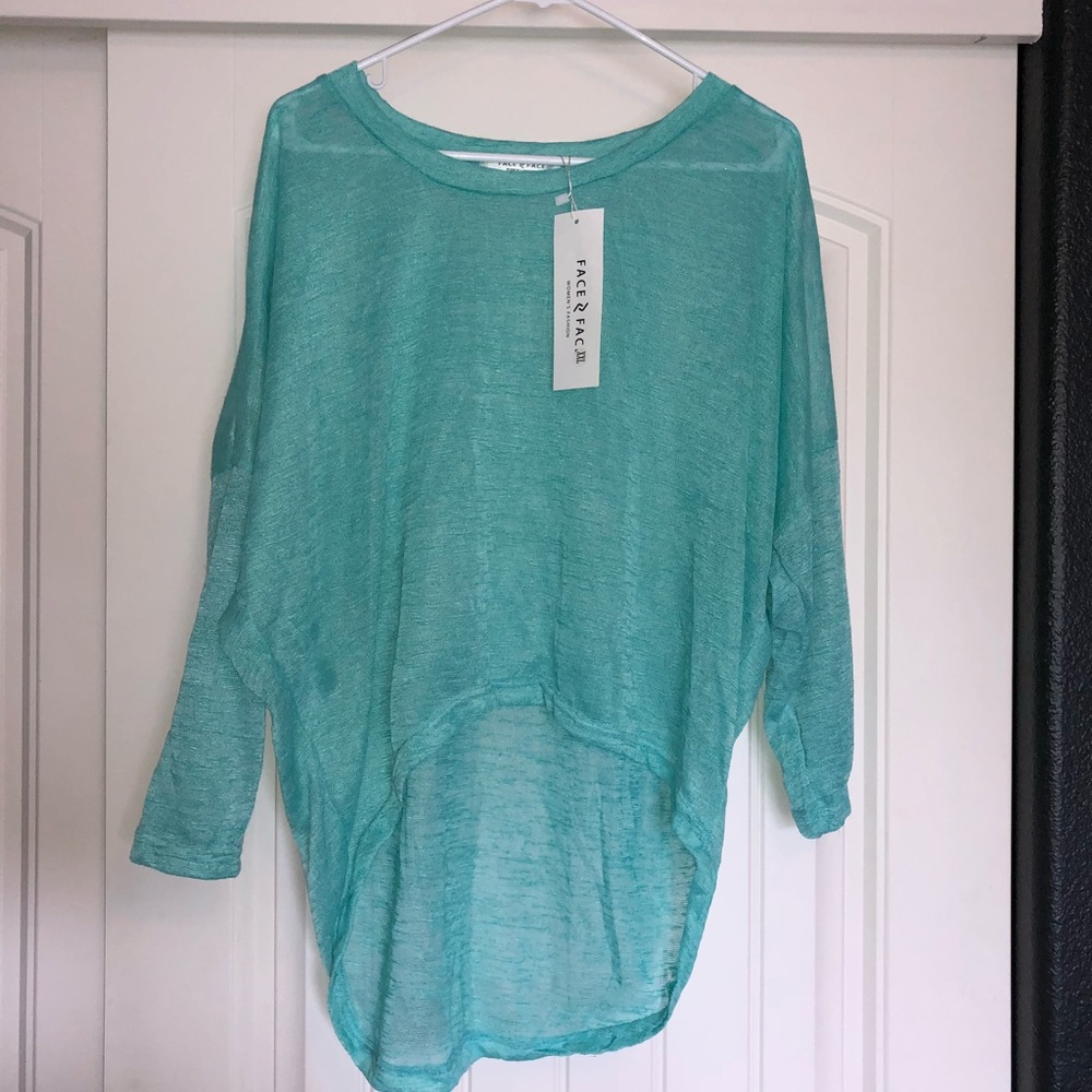 Face light blue bat wing hi low coverup